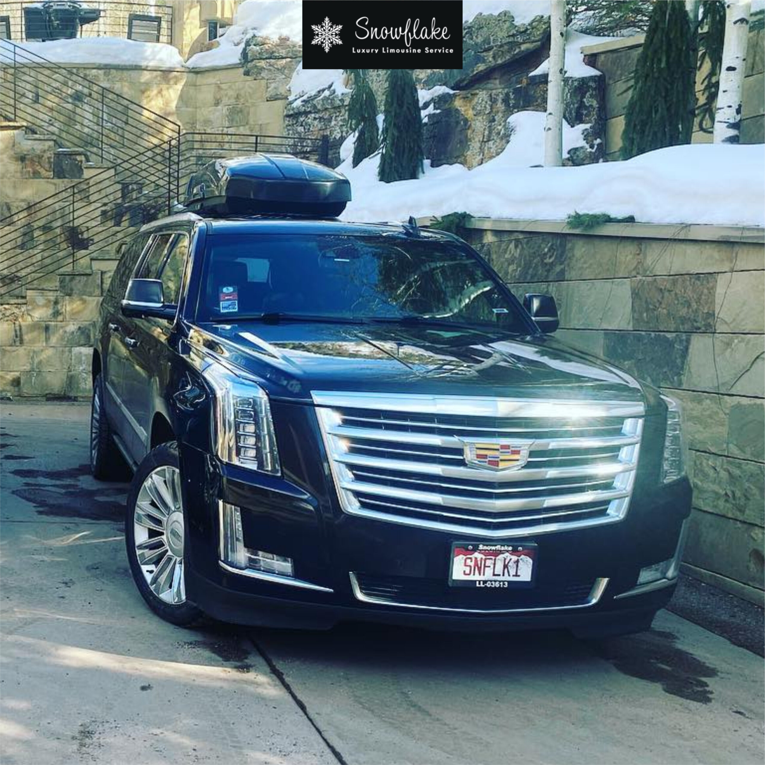 Luxury black SUV limousine for winter chauffeur service by Snowflake Limo.